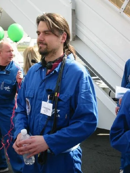 Research participant standing outside the aircraft after flight